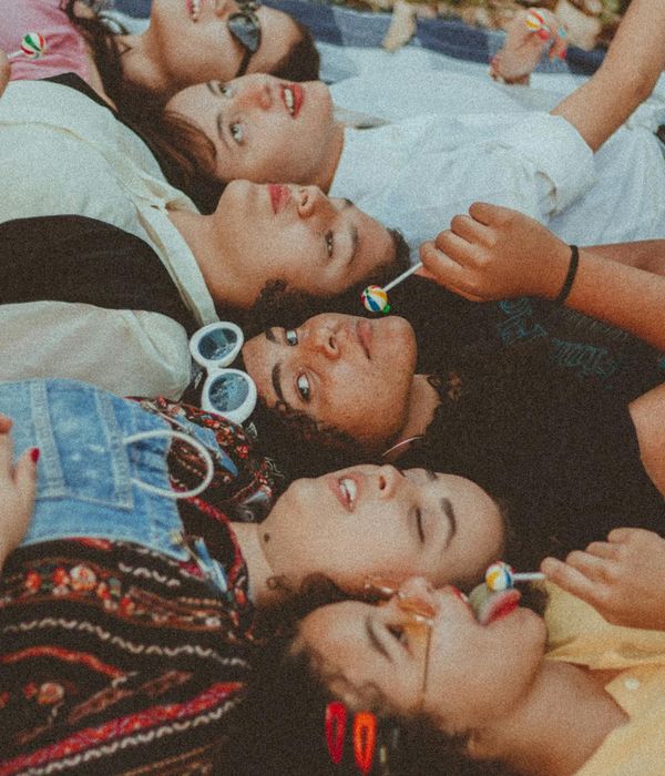 Person looking energized and happy outdoors in nature.